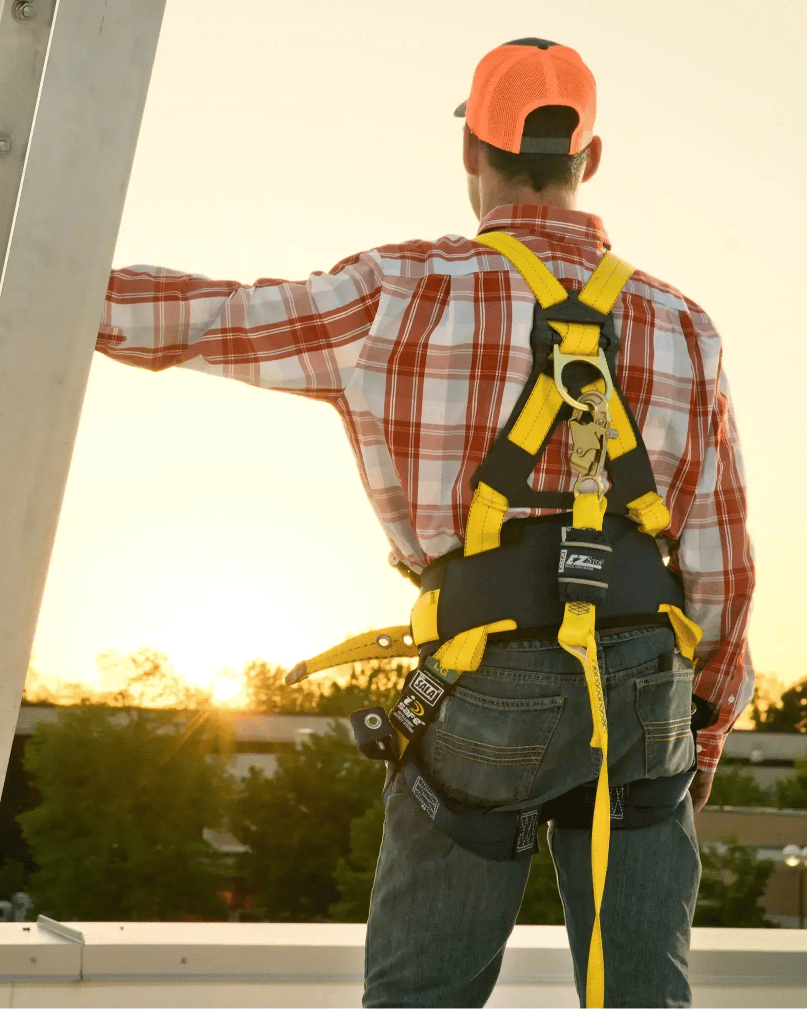 man wearing 3M harness and lanyard