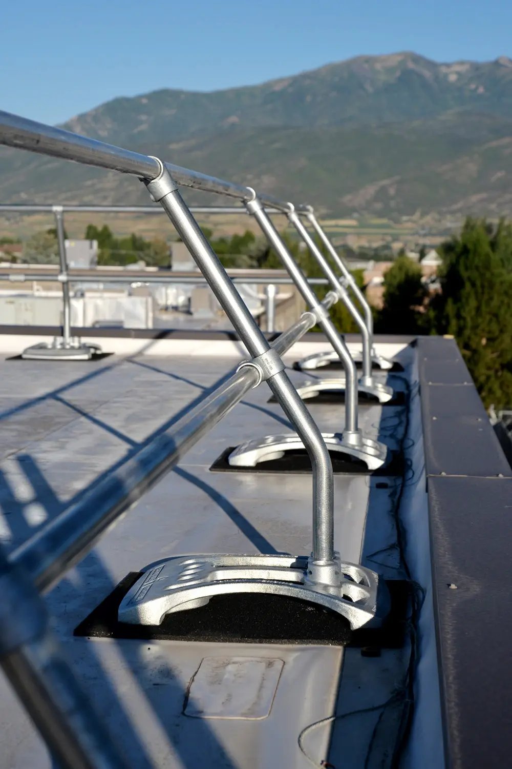 Passive Fall Protection Example: Diversified Fall Protection's Modular Guardrail Contoured Rail