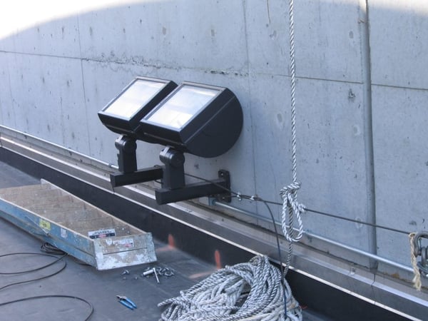 window washer rope tied off to a rooftop light fixture