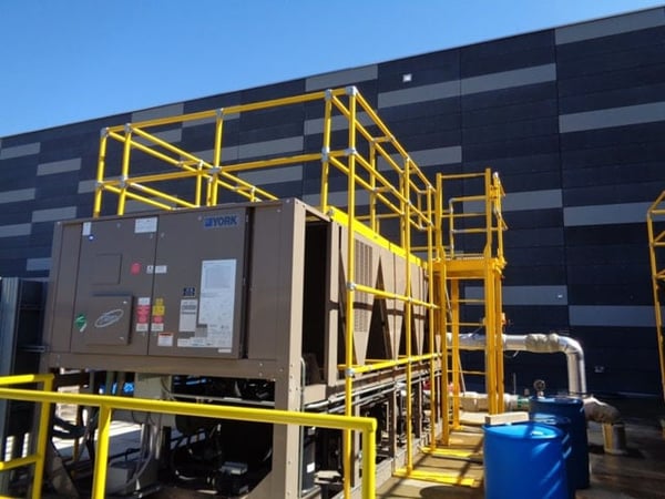 HVAC unit with DFP installed guardrail