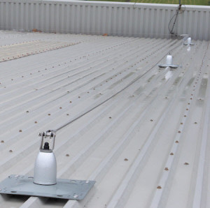 examples of travel restraint fall protection systems: lifeline system